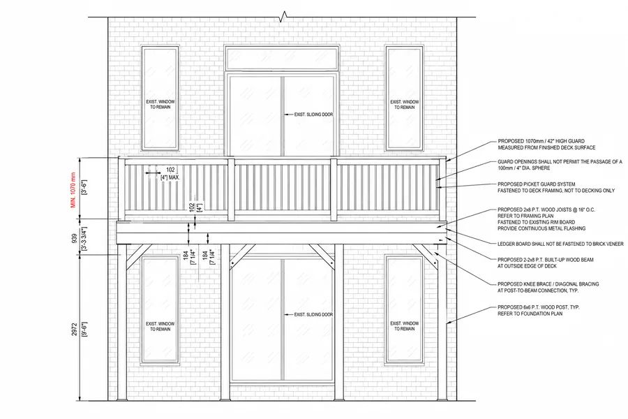 Rear elevation of a raised second-level wood deck in Whitby, Ontario